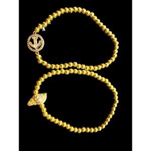 Set of Two Tropical Boat Anchor Shell Gold Metal Stretchy Bracelets
